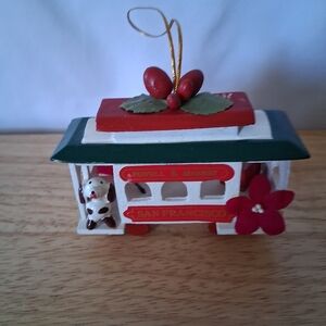 Festive Cable Car Ornament with Red and Green Accents